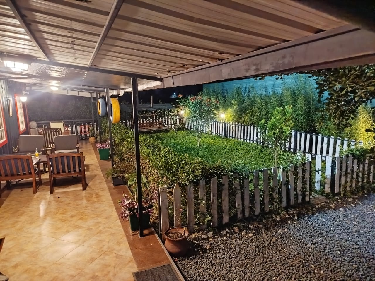 Sitting area and garden at night